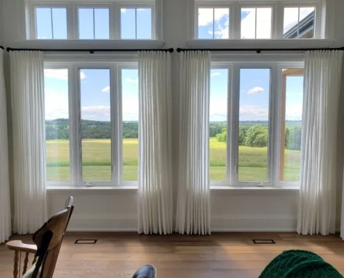 Tailored Coverings farmhouse installation with floor-to-ceiling drapery