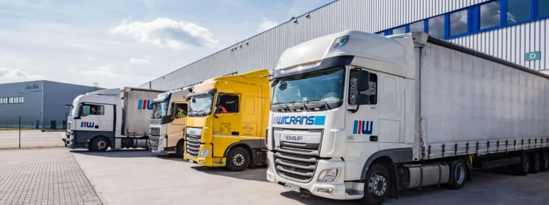 Transport trucks shown on the SIMMS cross-docking service page